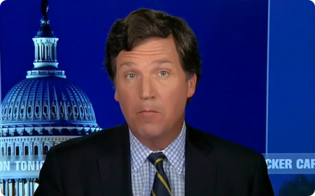 Tucker Carlson: Je možné, že Zelenskij je jen podvodník v joggingovém obleku, který chce naše peníze?