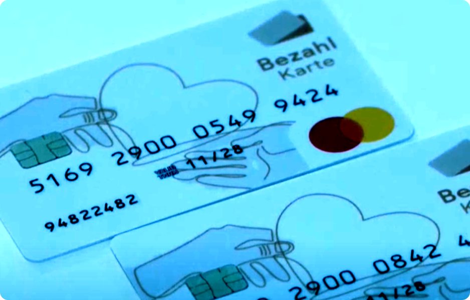 Německé platební karty pro uprchlíky testují spolkovou vládu